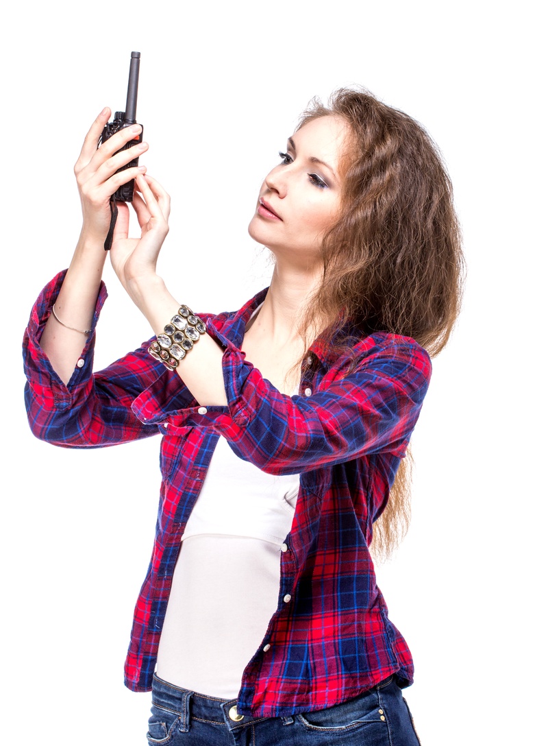 Girl looking at radio.